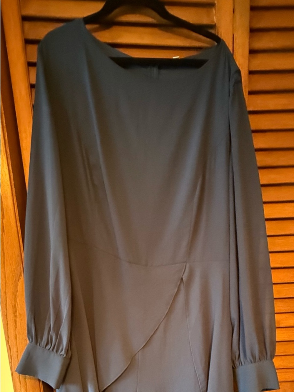 Long-Sleeve Jumpsuit in Blue. Looks like a dress from the back. Sheer sleeves.